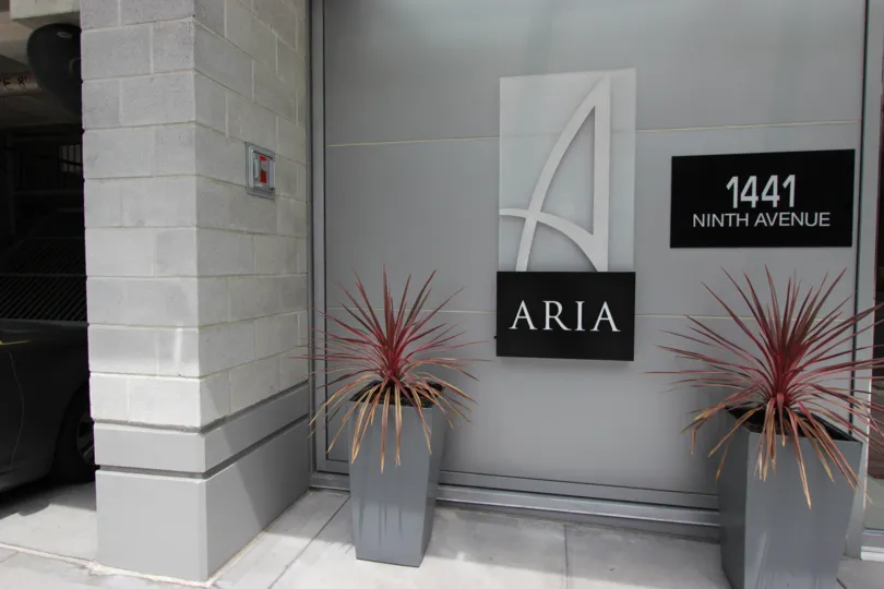 Black and gray sign in the lobby of Aria in Downtown San Diego CA