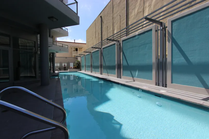 Icon, City: Downtown San Diego, A beautiful swimming pool with buildings on both the sides