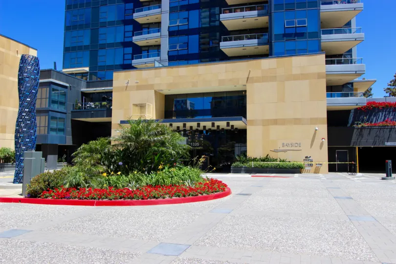Planter with a red curb around it at Bayside in Downtown San Diego CA