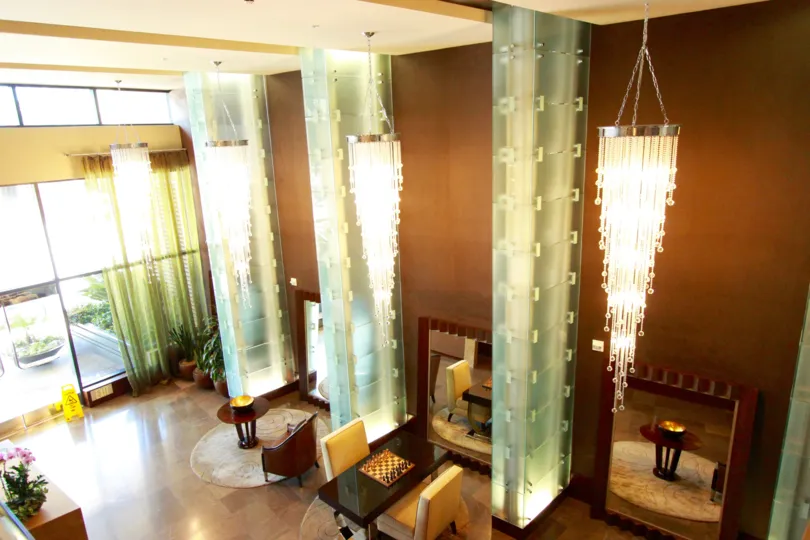 Atrium with glass architectural features invites you to stay awhile at Bayside.