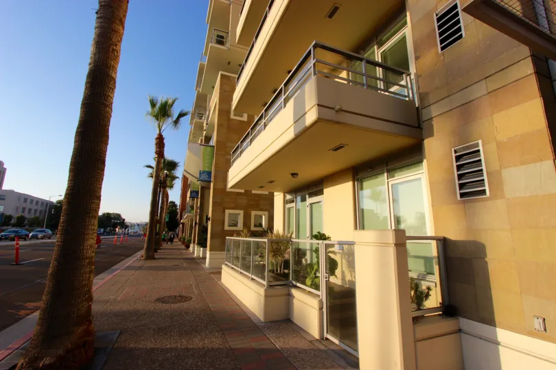 A second floor balcony overlooks the street at Breeza condos