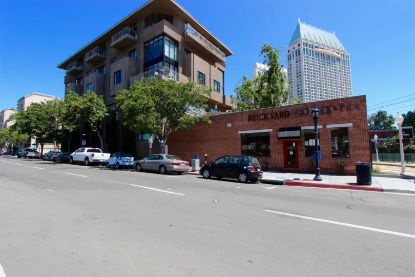 Red brick building next to a street at Brickyard in Downtown San Diego CA