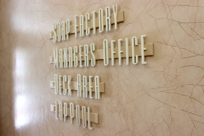 Sign for Soap Factory, Manager's Office, Deck Area, and Lap Pool for Cityfront Terrace in Downtown San Diego, California