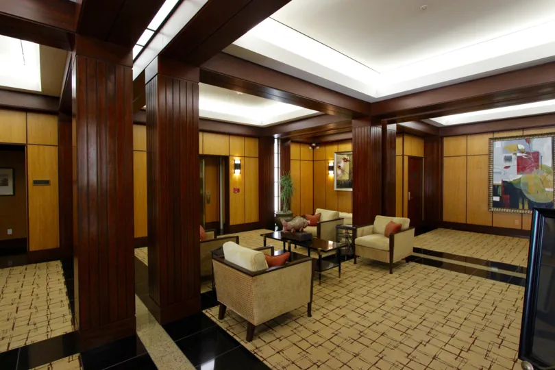 Furniture in a carpeted lobby at Cityfront Terrace inside Downtown San Diego CA