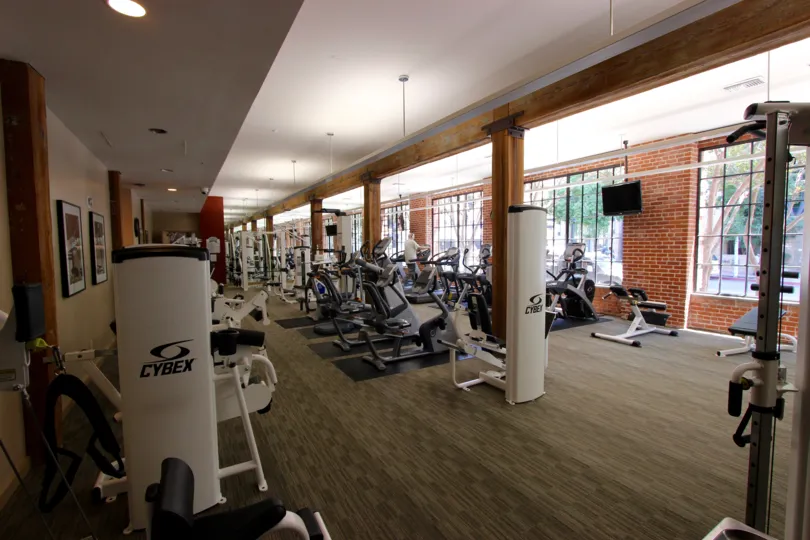 Workout Room at the Cityfront Terrace with white workout machines