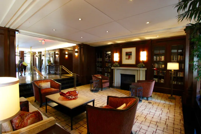 Fancy lobby with furniture and a fireplace at Cityfront Terrace in Downtown San Diego CA
