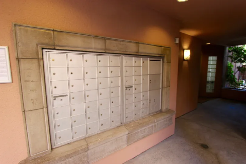 Silver mail boxes inside the lobby of Columbia Place in Downtown San Diego