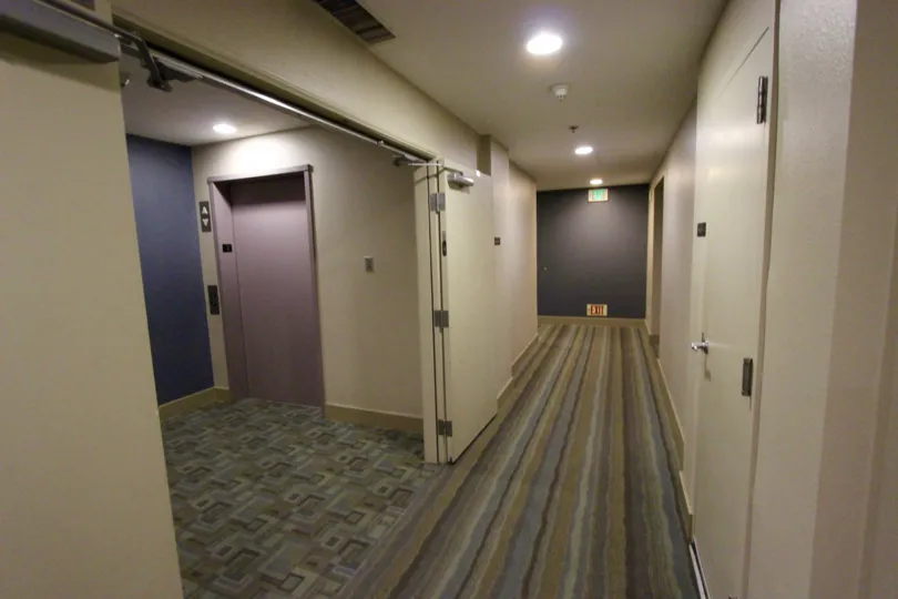 Interior hall way with elevator in the Diamond Terrace community in downtown San Diego, CA