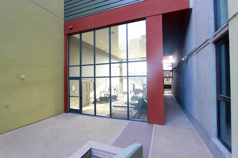 Red gym structure with see through walls at DOMA in Downtown Sand Diego CA