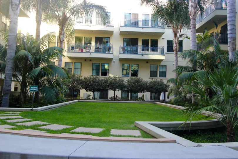 Tropical courtyard overlooked by balconies at DOMA in San Diego