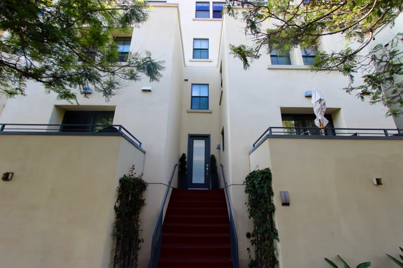 Huge building with narrow entrance door and steps in DOMA.