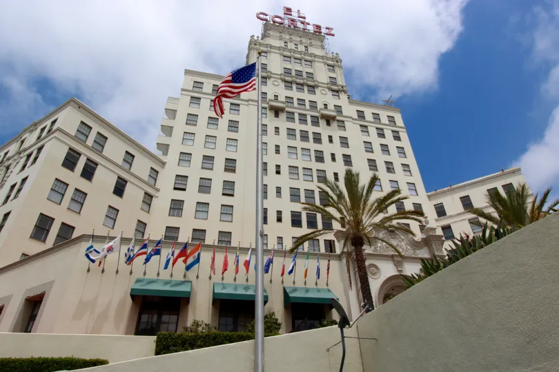 the hotel is international in fron of hotel has some country flags too