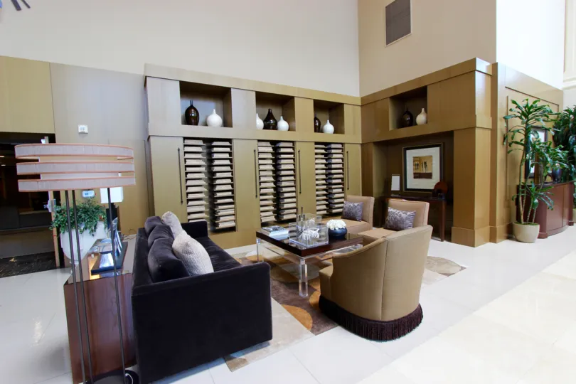 A living room space in Electra with lots of books and decorative items