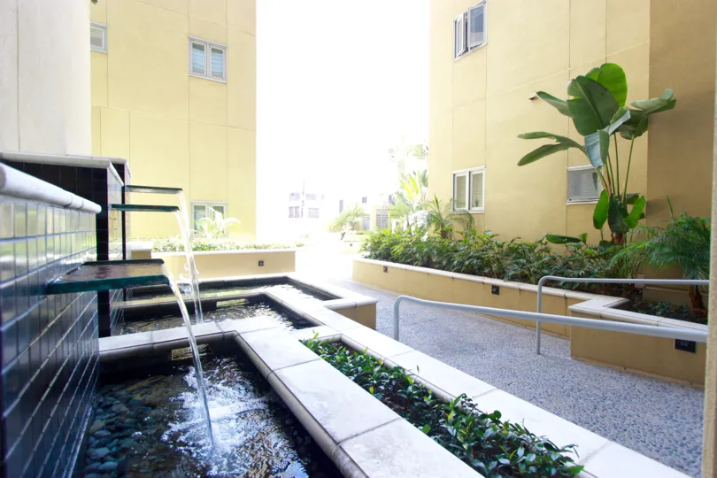 Fountains and beautiful landscaping adorn the walkway at Element.