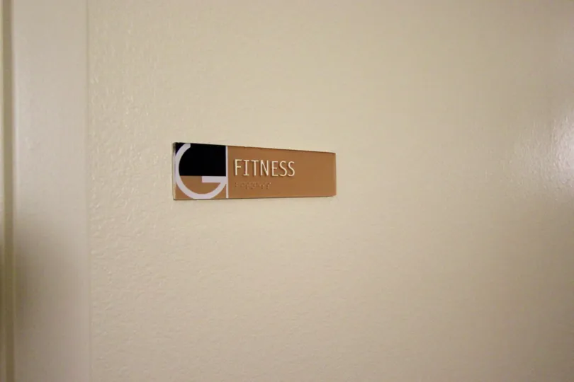 A sign on the wall identifying the Fitness room in Gaslamp City Square in downtown San Diego, CA