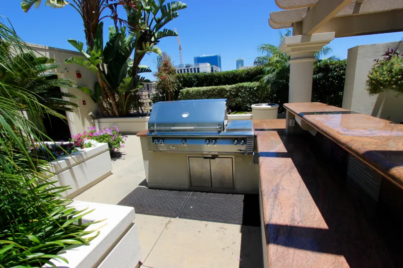 Enjoy outdoor grilling with friends on the patio at Harbor Club.