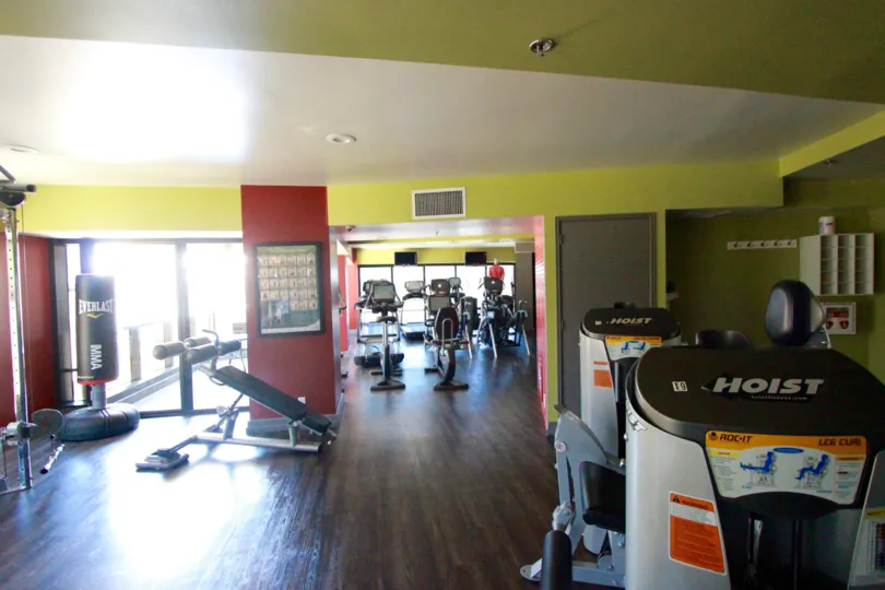 Large gym rooms with wooden floors at Harbor Club in Downtown San Diego CA
