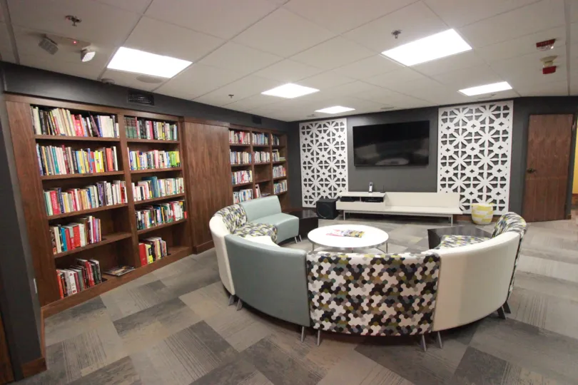 the room has tv ans some books and comfortable chairs