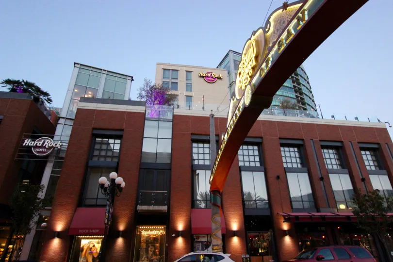 neon sign attached to a building at Hardrock inside Downtown San Diego CA