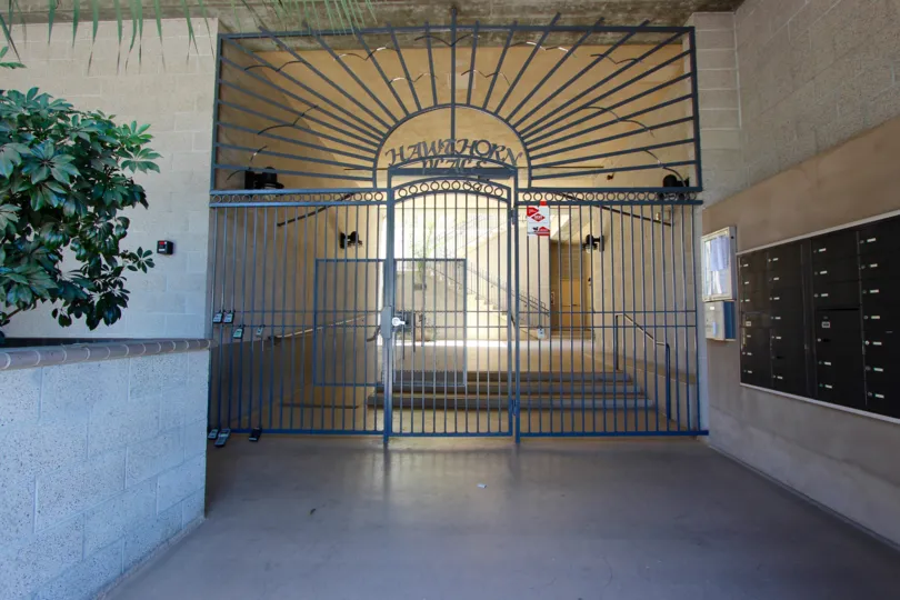 The front entrance gate to the Hawthorn Place building in Downtown San Diego CA
