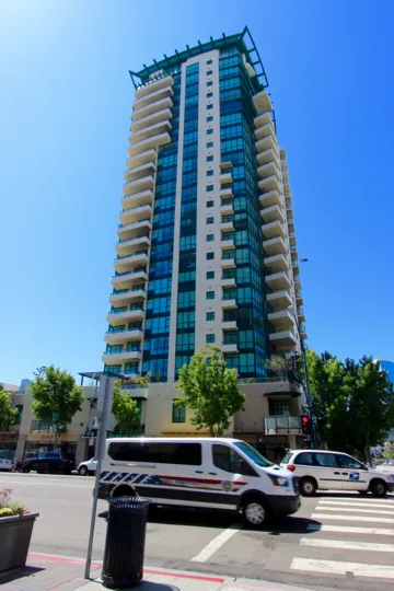 Complete view of the mirror building with trees and plant in Horizons