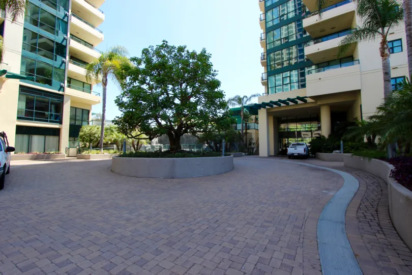 THE APARTMENT IN THE HORIZONS WITH CAR PARKING, TREES, PLANTS.