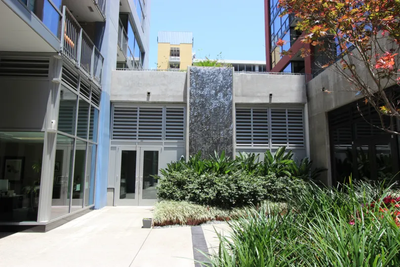 Shrubbery and trees in a courtyard at Icon in downtown San Diego, CA