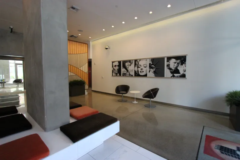 Marilyn Monroe paintings on a white wall inside the Icon at Downtown San Diego CA
