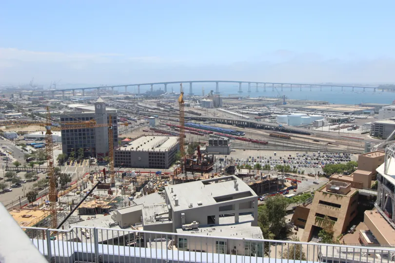 A bridge half hidden in fog is visible from the terrace at Icon conodos