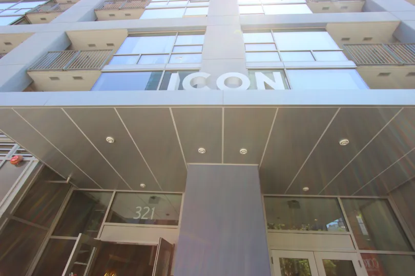 Front portico with balcony and glass entrance in Icon.