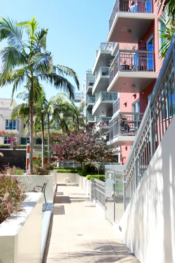 A pink apartment building side view in the La Vita area in Downtown San Diego CA.