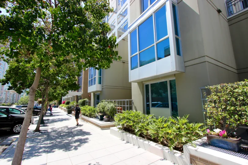 A sidewalk view of a building in La Vita area of Downtown San Diego CA.