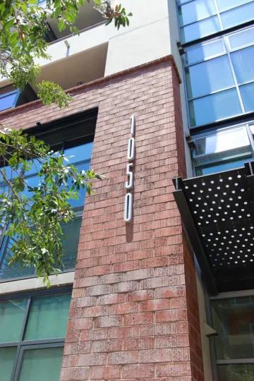 The Brick wall in Large apartment mentioned as 1050 in M2i community