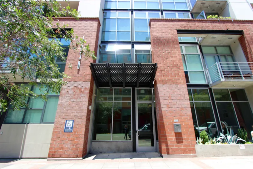Brick building with many glass windows at M2i in Downtown San Diego Ca