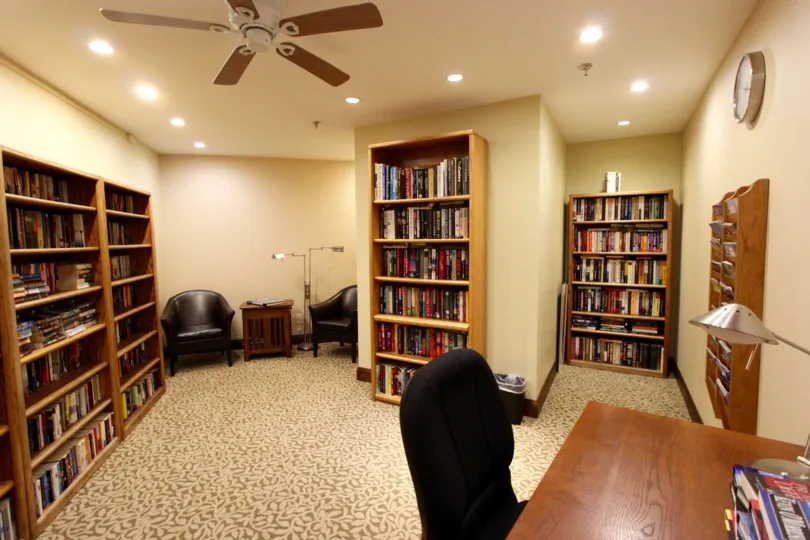 Nice ceiling fan with brown color and book racks in Marina Park.