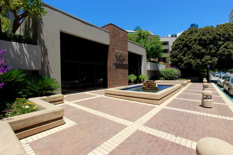 Bbeautiful front view with trees and plants with Front car parking in Marina Park
