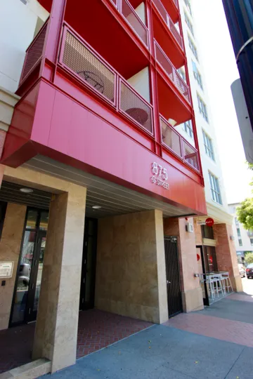 Dazzling red colored iron fenced balconies in every floor in Nexus.