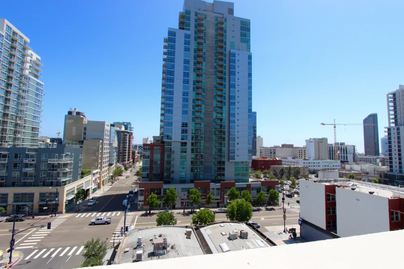 Elevated city shot of the Nexus community in Downtown San Diego, CA focusing on a high rise building.