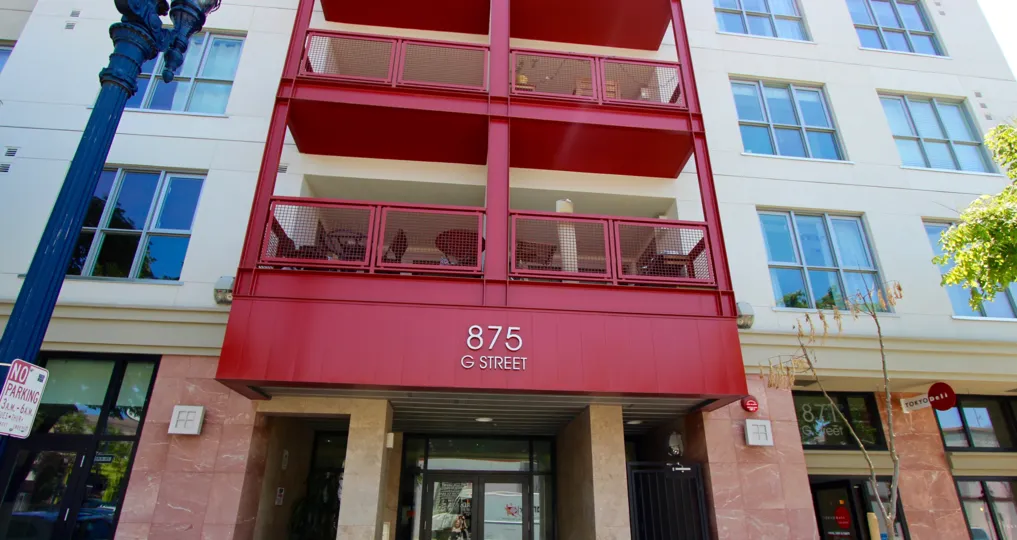 A sunny day in the area of Nexus, ousdies, entrance, balcony, signs, door