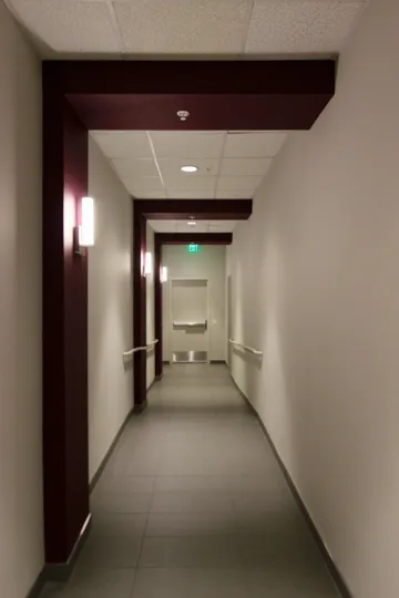 Inner view of a building with nice ceiling and exit door in Nexus.