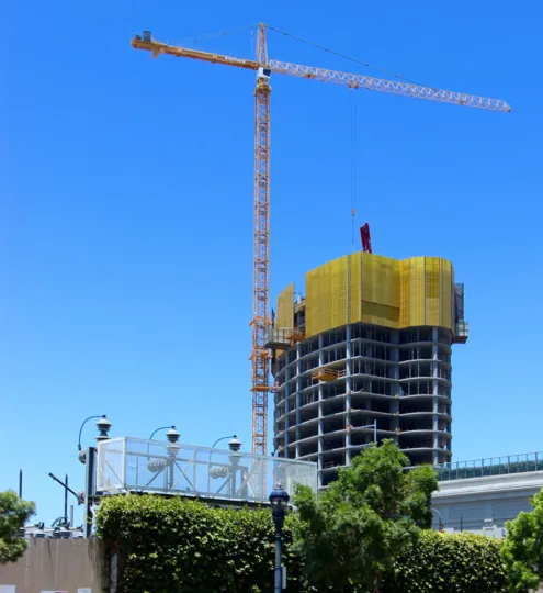 A huge crane using to construct a high rise building in Downtown San Diego, California