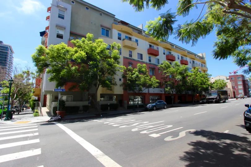 Street view of the building decorated with plants and trees in Palermo