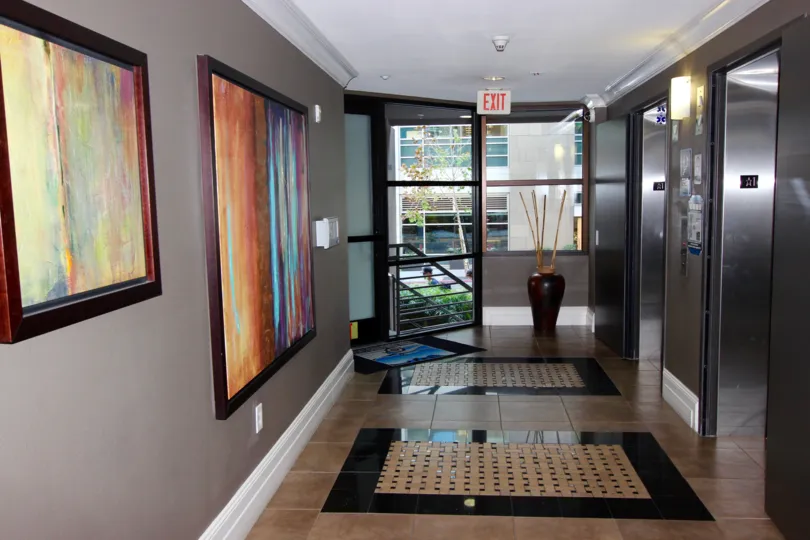 Prk Blvd East House corridor containing a beautiful pieces of artwork.
