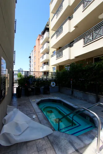 Apartment building with pool access. Area quiet and shady.