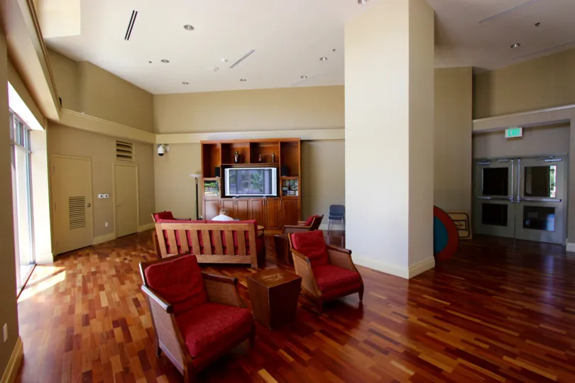 A television sits on a entertainment unit in a community room at Park Place condos.