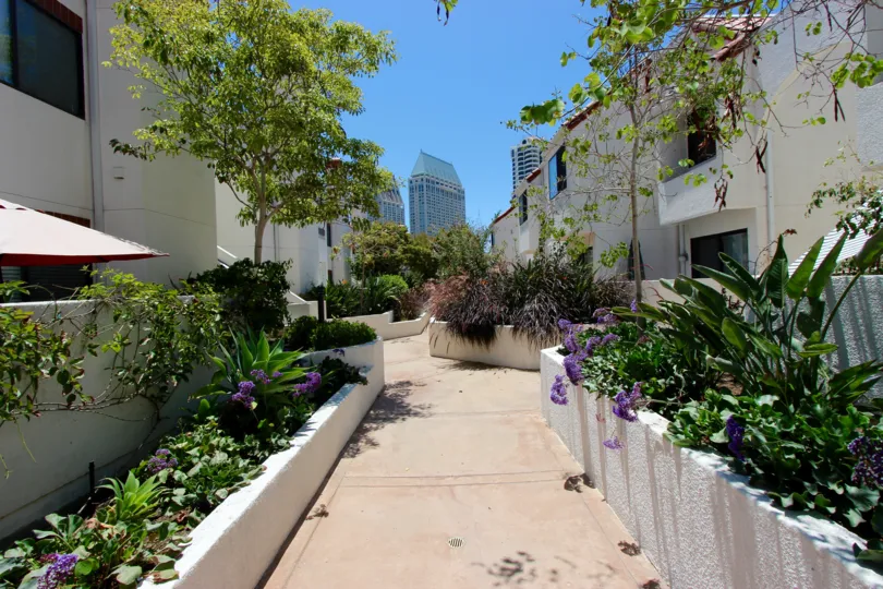 Path through apartment block in Park Row, Downtown San Diego, California
