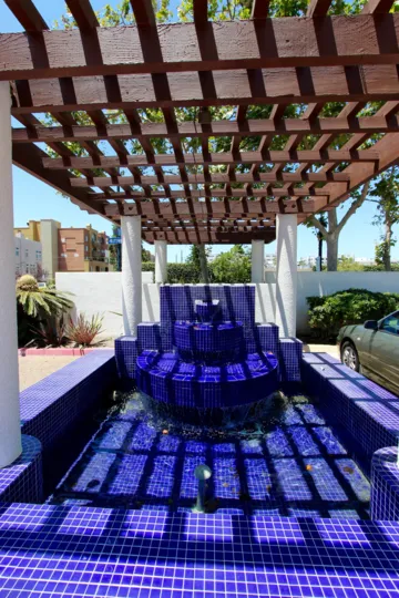 A wishing well on the outside of a building in Park Row Downtown San Diego CA