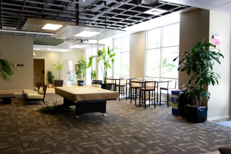 Park Terrace, City: Downtown San Diego, a nice table in the middle of a beautiful hall and other small tables and indoor plants