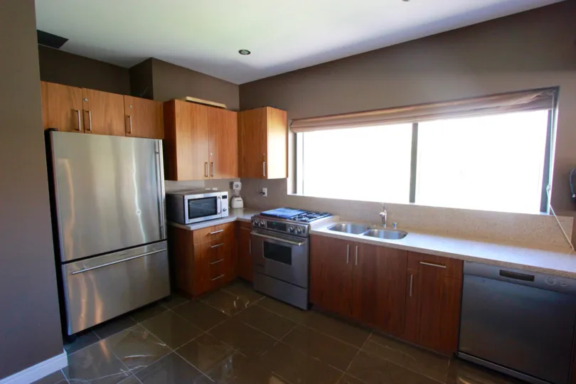 Clean, bright kitchen area for cooking meals at Pinnacle.