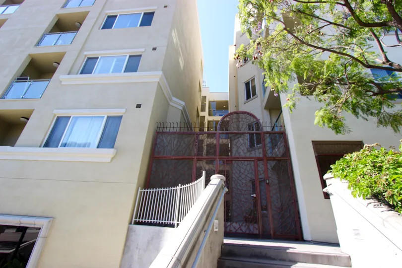 THE APARTMENT IN THE Porto Siena WITH GRILL GATE, TREES, UPSTAIRS.